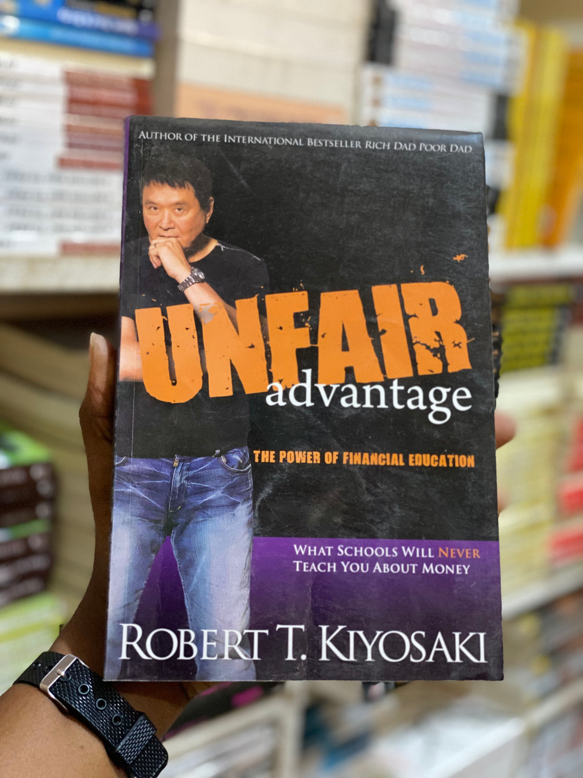 Unfair Advantage by Robert T. Kiyosaki, front cover